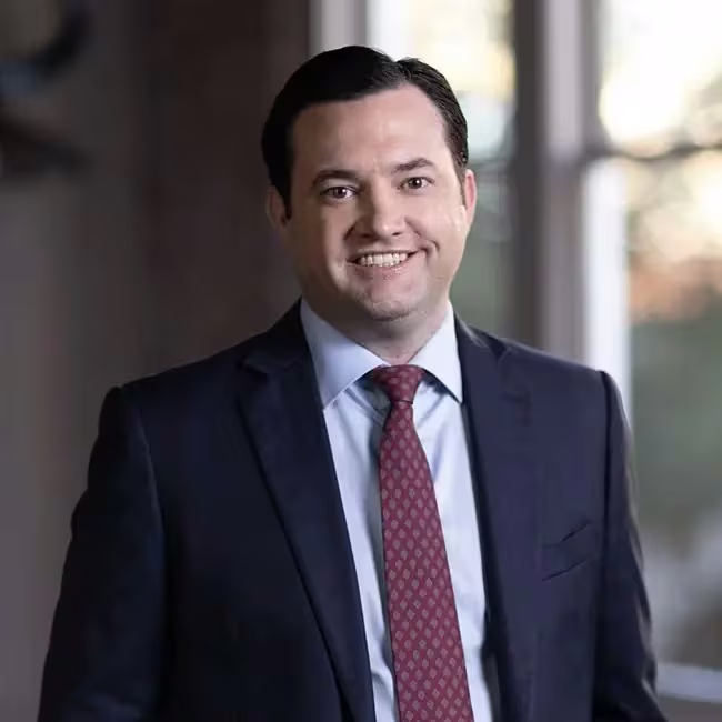 Justin Dewett, partner