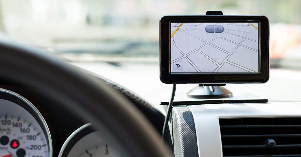 GPS device mounted on the dashboard of a car