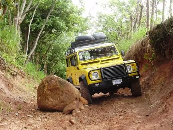 jeep driving over crosswalk