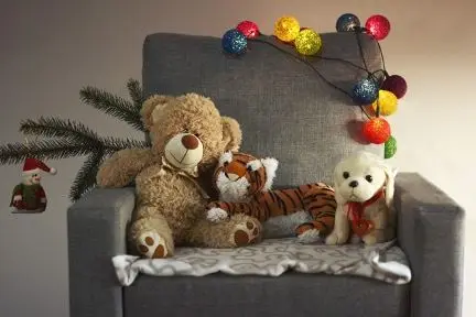 stuffed animals on chair