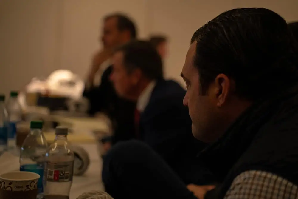 Man listening to a speaker