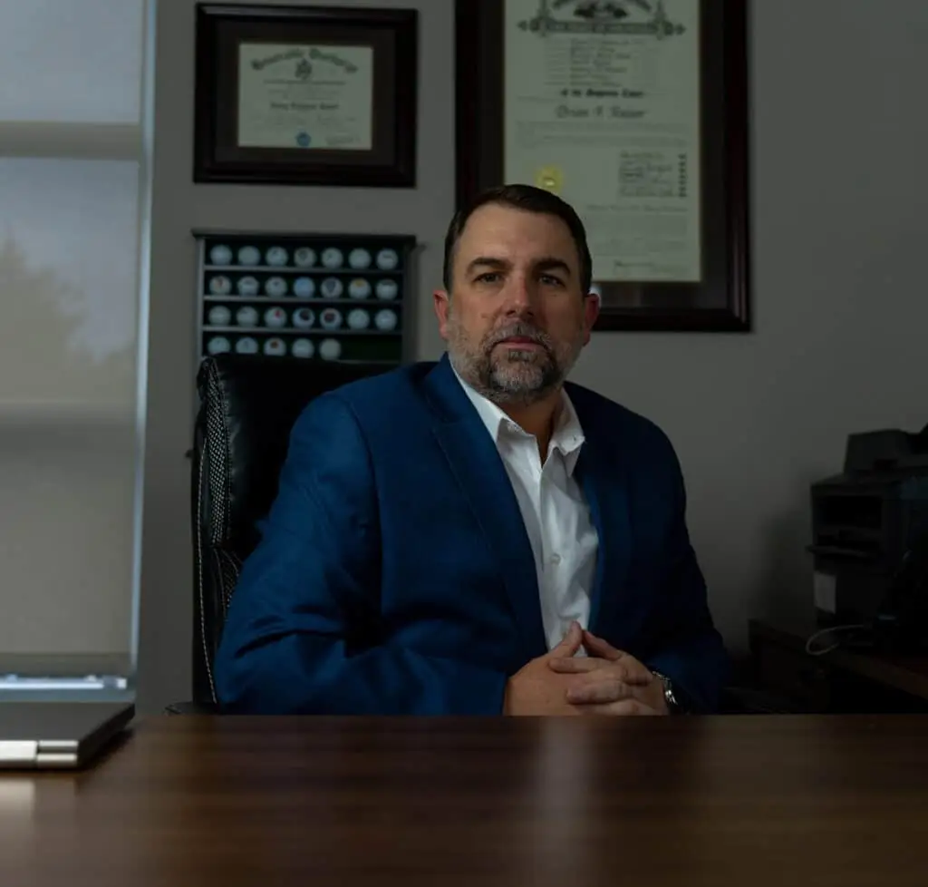 Man sitting in front of a desk