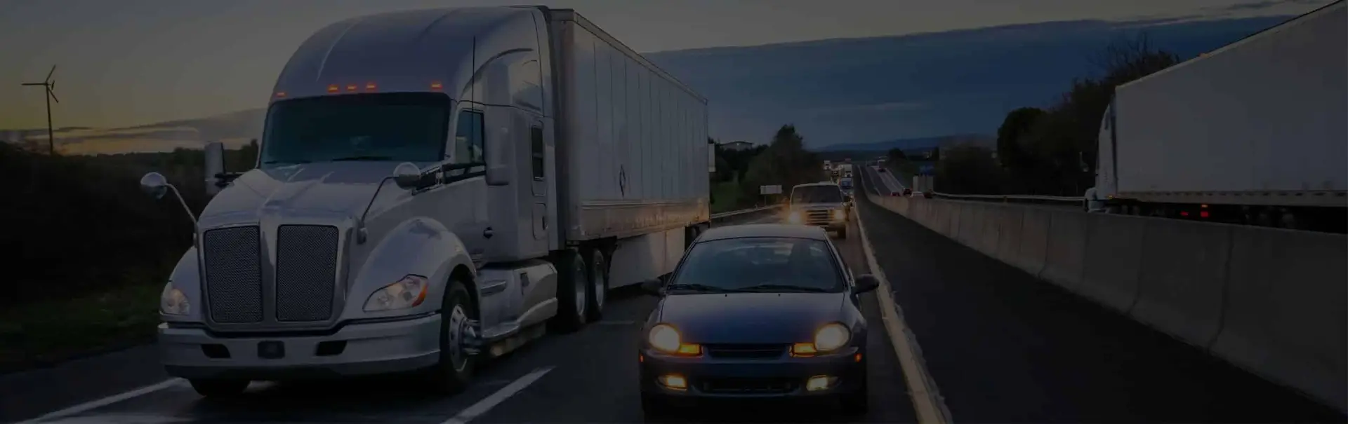 sedan passing large truck