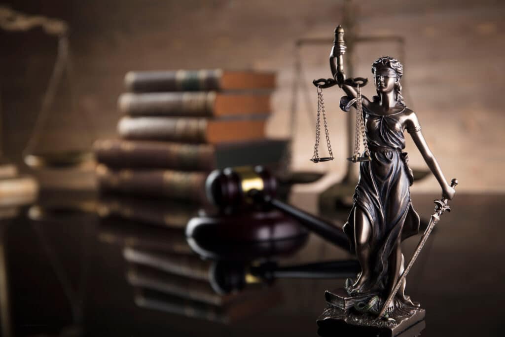 Lady of justice statue on a desk