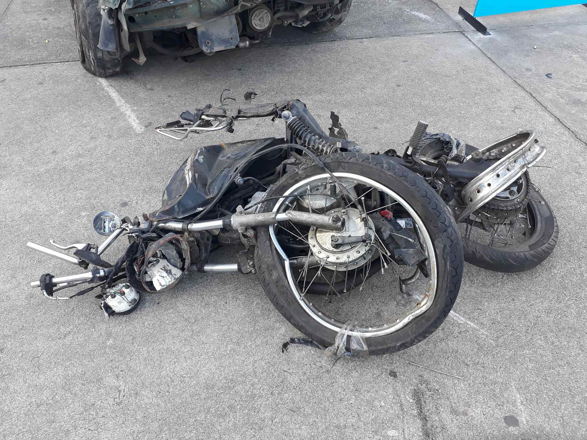 A wrecked motorcycle after a traffic accident