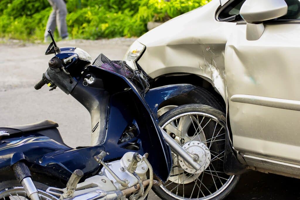 Motorcycle accident with a car.