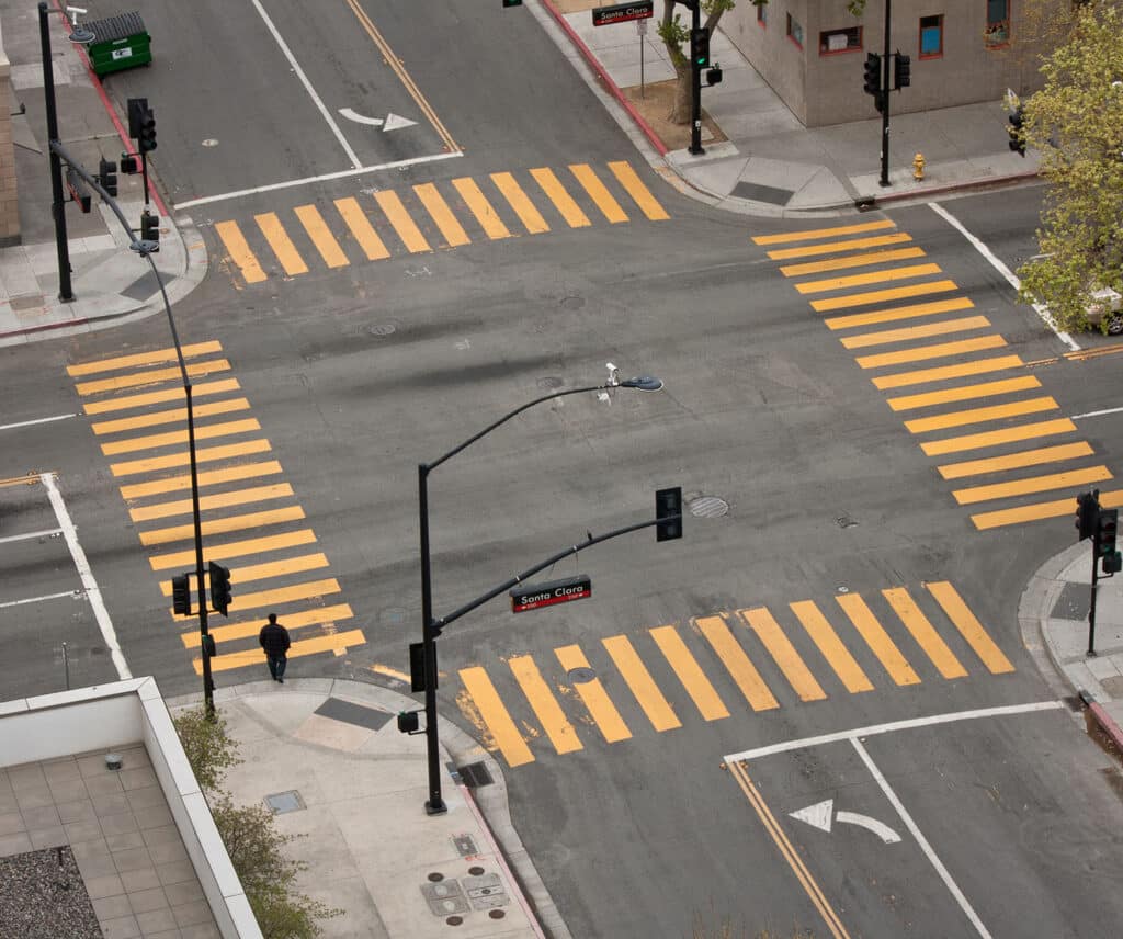 A high angle view of an almost empty street intersection