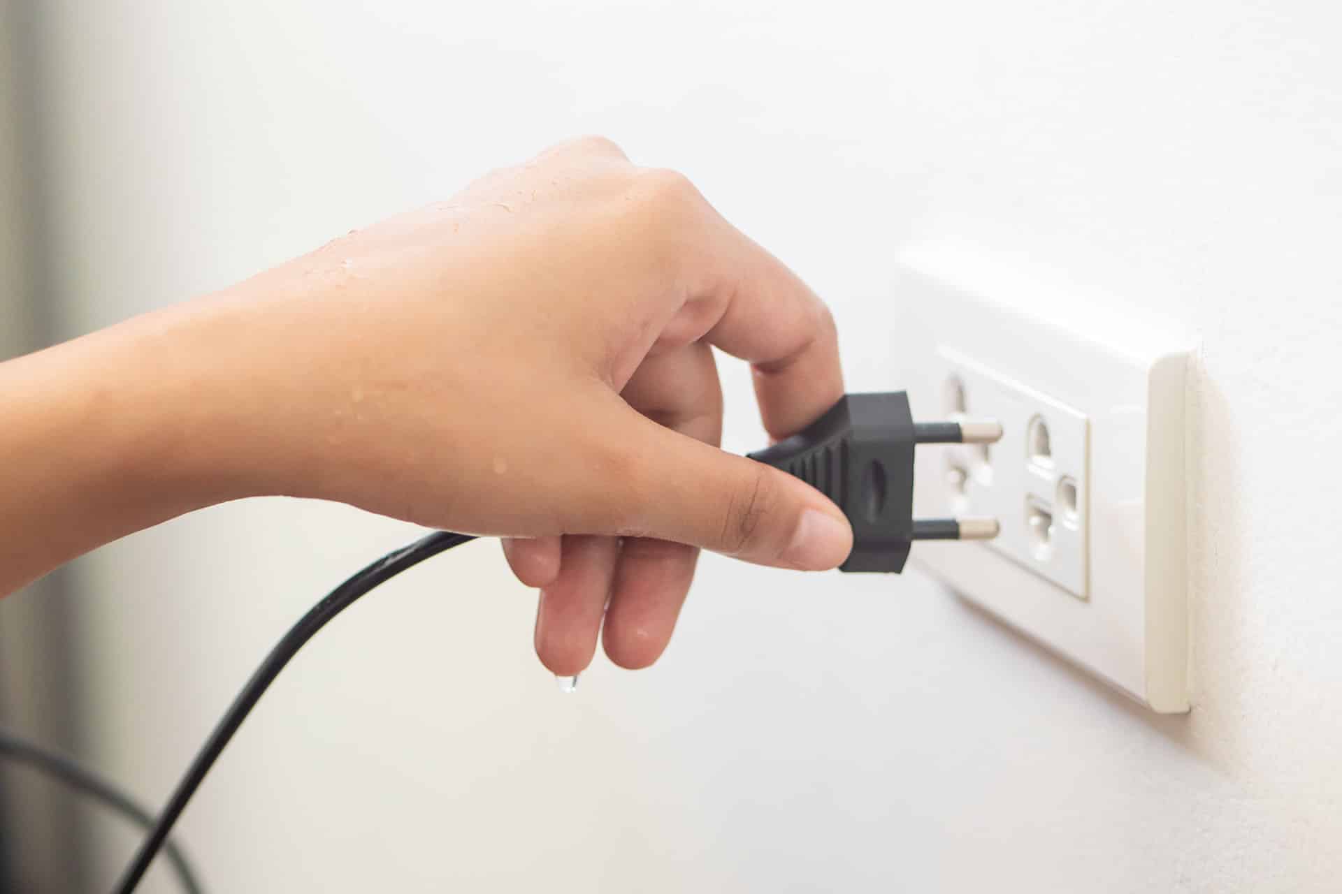 Using electricity wall outlet with wet hand