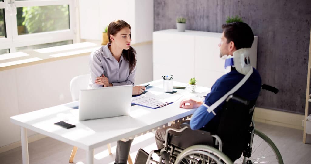 Accident disability claims attorney or lawyer and injured client