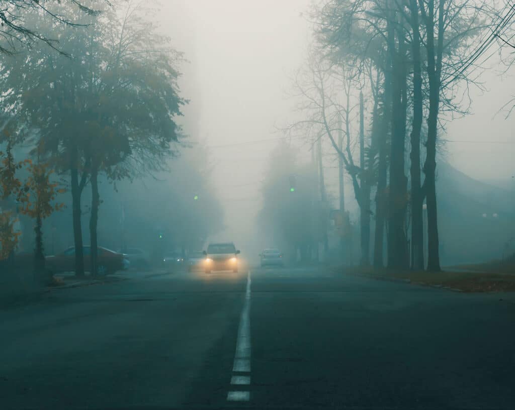 Fog on the road in the city.