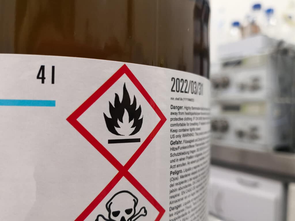 Label of a hazardous chemical in a scientific laboratory.