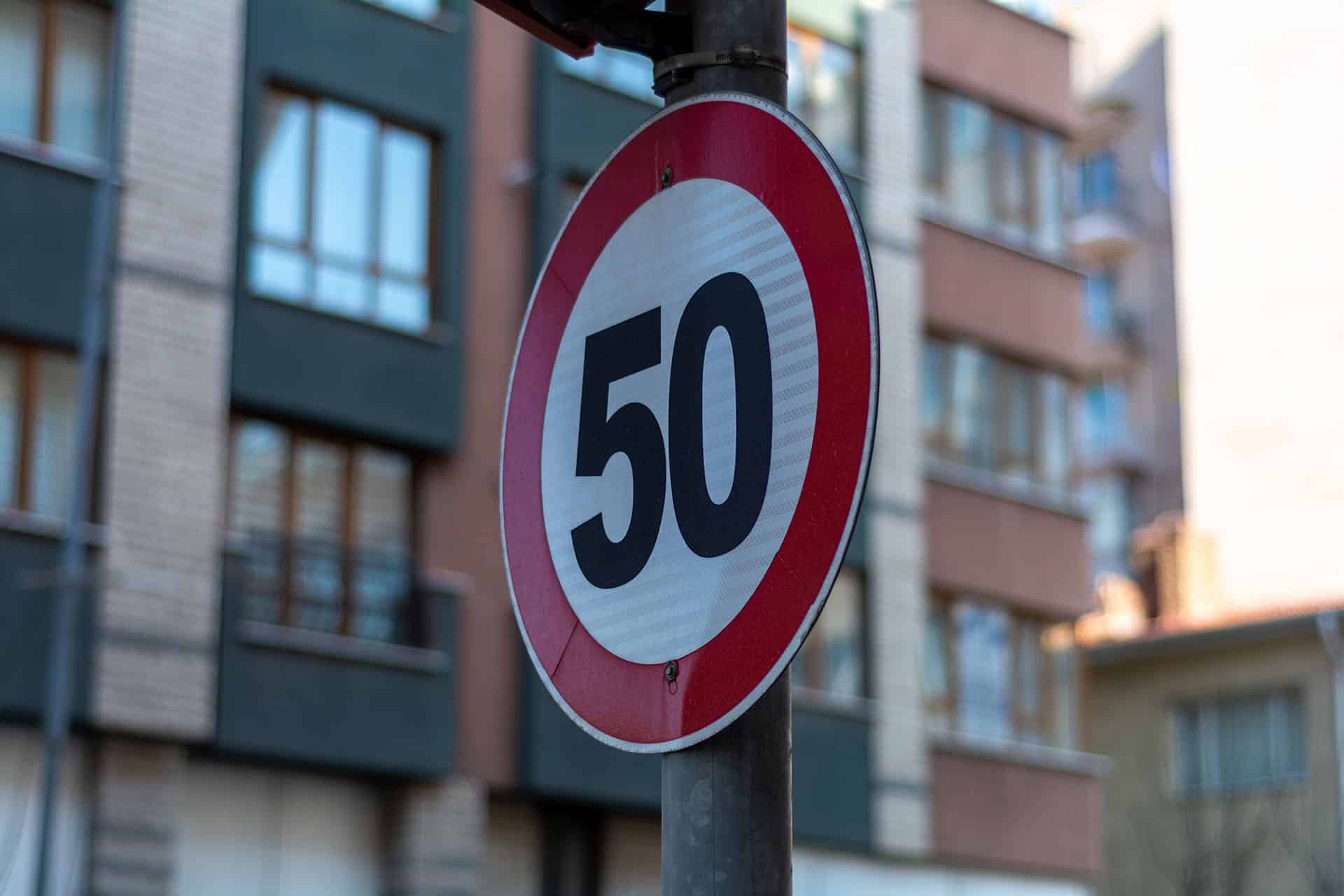 50 kilometers per hour speed limit sign.