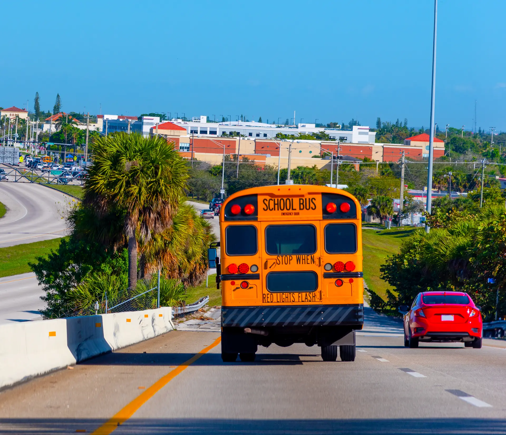 the rear view of a of school bus on the highway in louisiana