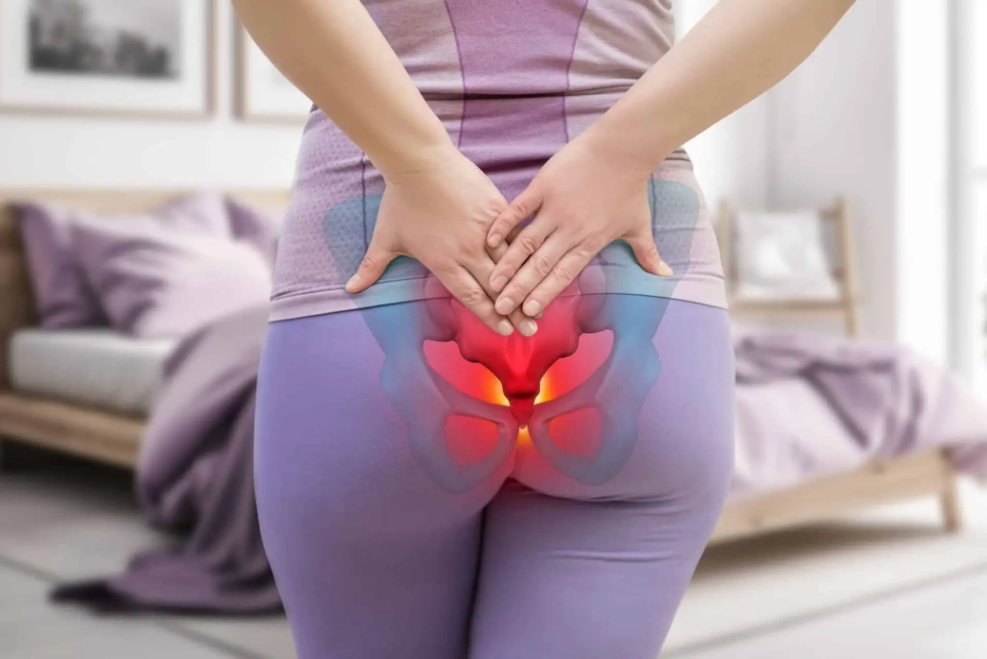 a womans backside, with a red highlighted area showing the tailbone region of the lower spine