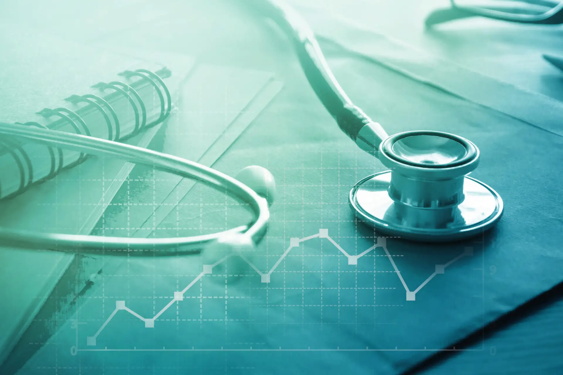 a graphic enhanced photo of a medical chart and a stethoscope for a blog on maximum medical improvement