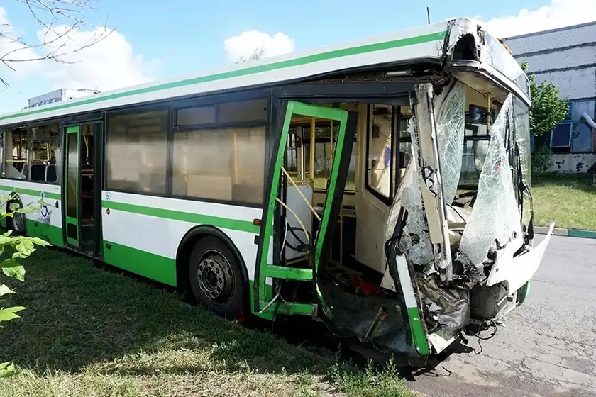 Broken in an accident the bus is in the parking lot