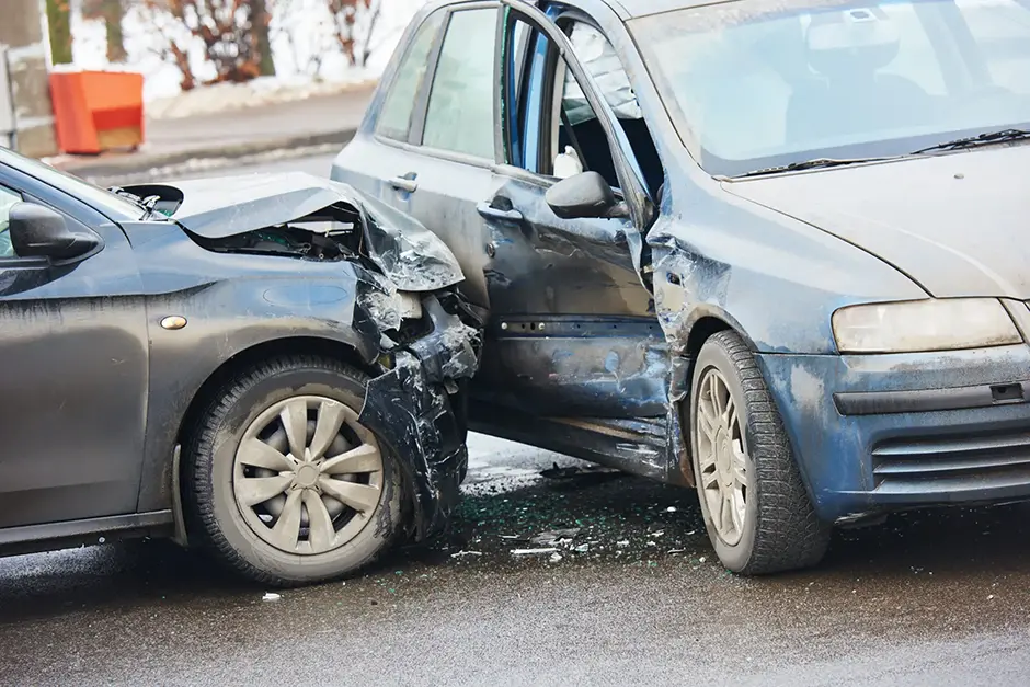 aftermath of a t-bone car accident on a street